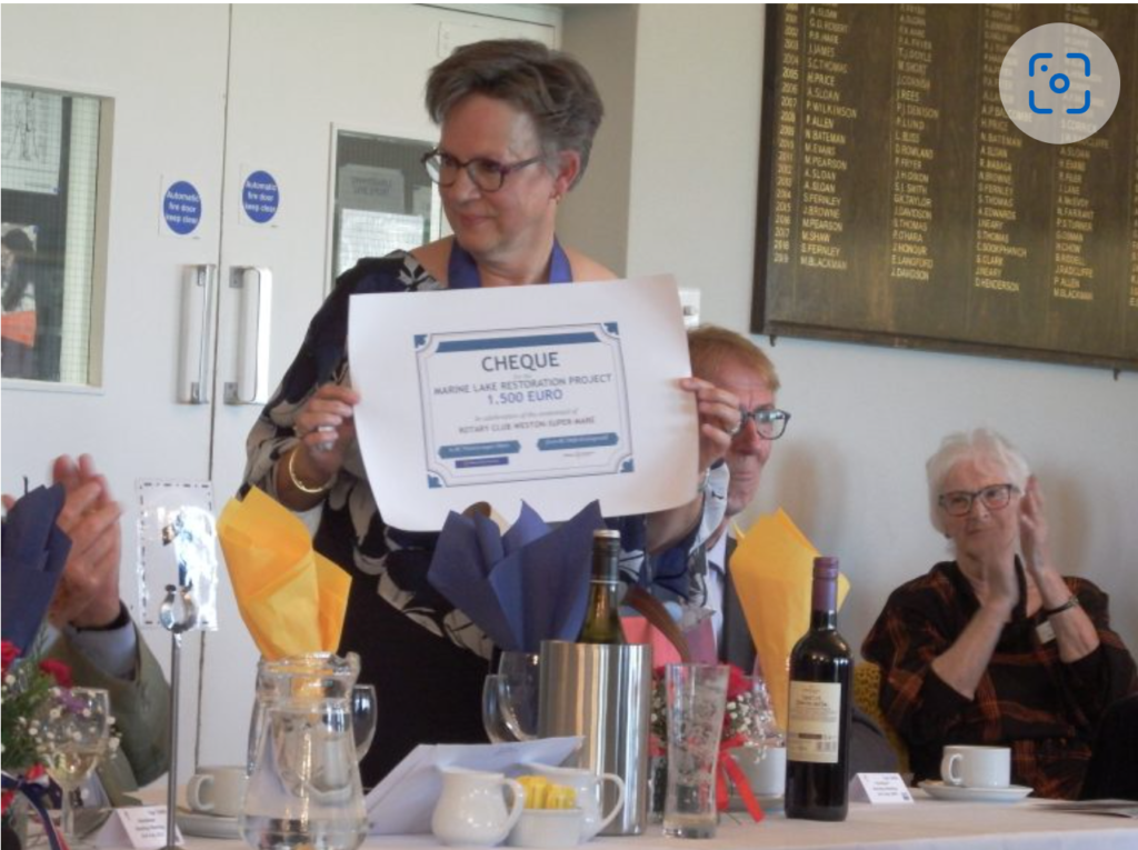 This photo is of Delft Rotary President Edith presenting the cheque to Weston Rotary.